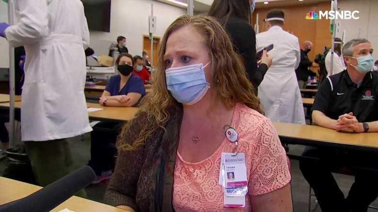 Ohio nurse receiving Covid vaccine says she is 'happy to be part of the solution'