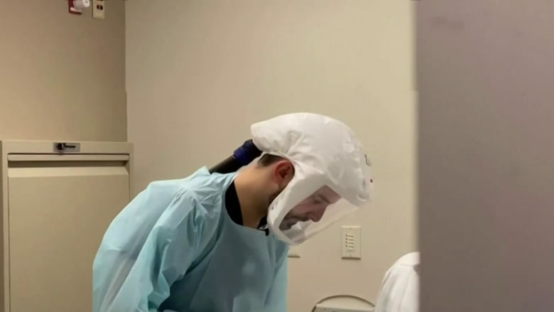 Coronavirus: hospitals struggle with surge amid holiday travel