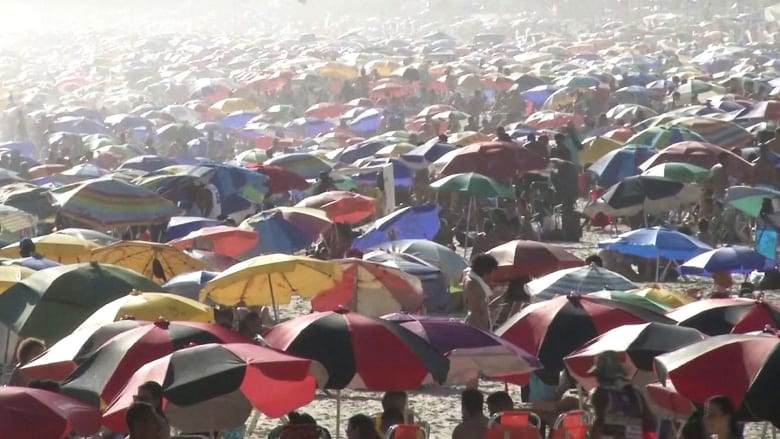 Brazilians flock to the beach despite surge in Covid cases