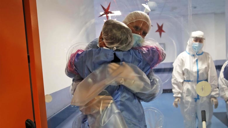 Plastic hug wall brings joy to Italian Covid patients
