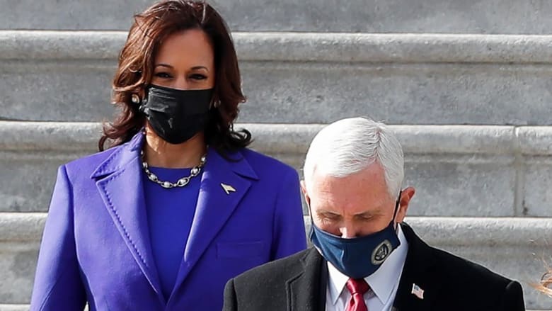 Kamala Harris waves goodbye to Mike Pence in moment of unity
