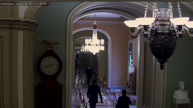 Security footage shows Officer Goodman direct Romney to safety during Capitol riot