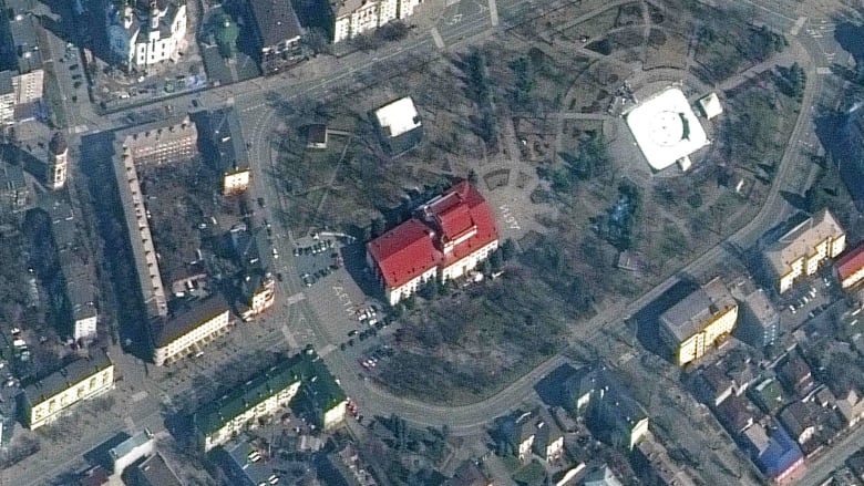 Ukrainian theater with signs that read ‘children’ attacked by Russia