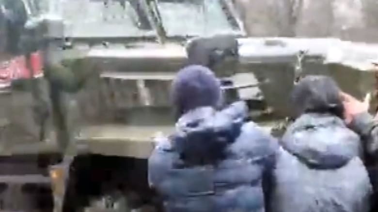 Watch: Civilians resist military convoy in Melitopol, Ukraine