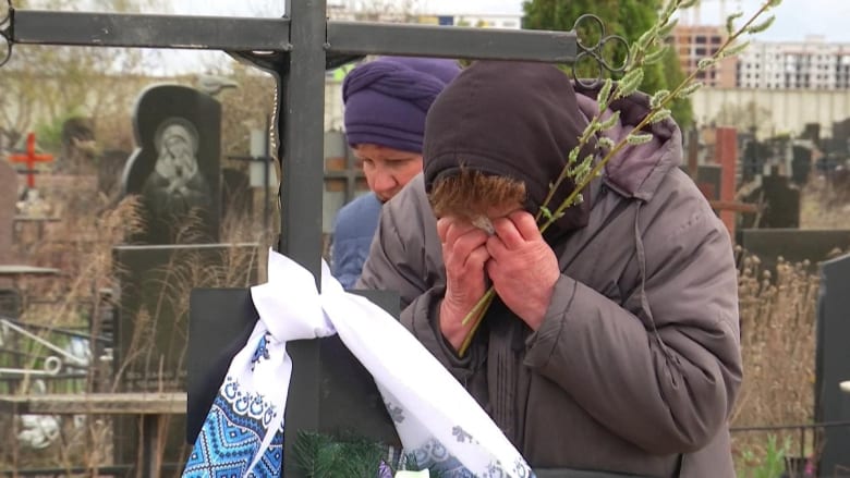 Ukrainian Orthodox Christians mark Palm Sunday in town scarred by Russian atrocities