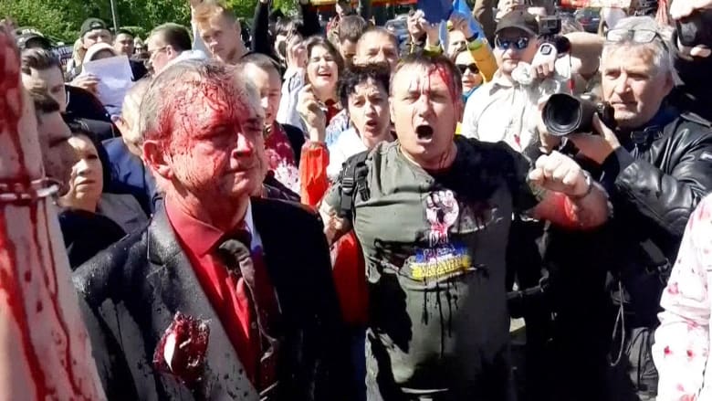 Russian ambassador to Poland attacked with red paint at World War II memorial