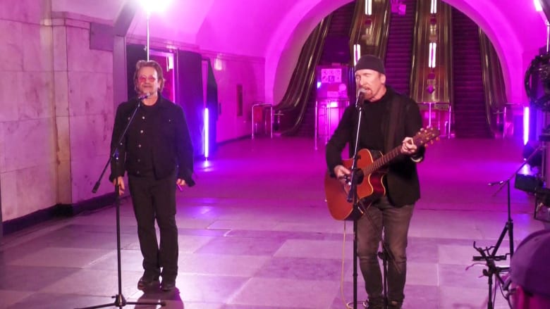 'We say thank you': U2 rockers Bono and The Edge stand with Ukraine in surprise performance