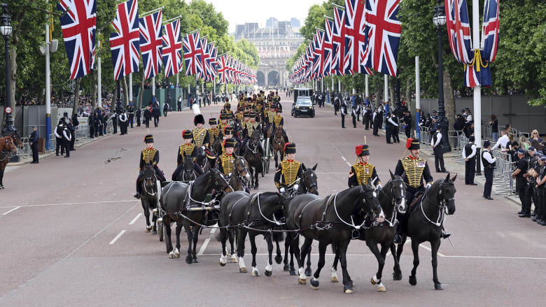 Where will Harry and Meghan be while royal family is on balcony?