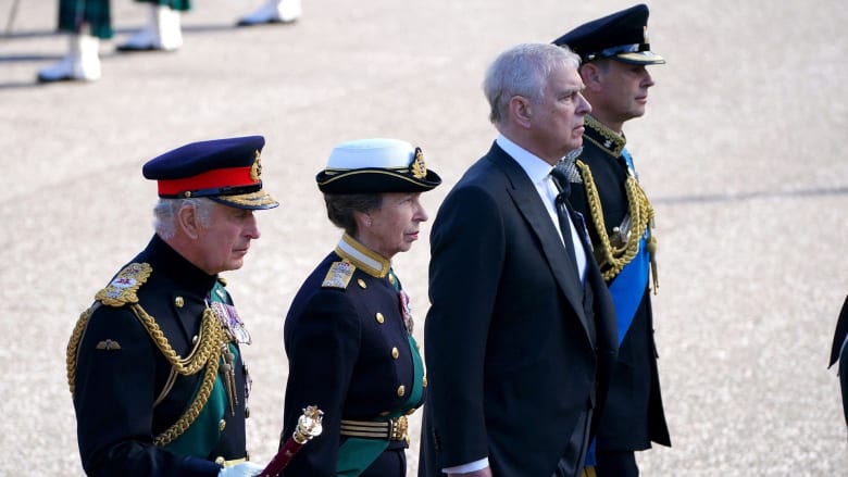 Queen's children walk behind her coffin as it arrives at St. Giles