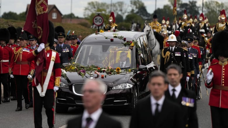 British public gets last look at Queen Elizabeth II’s casket as it arrives at Windsor Castle