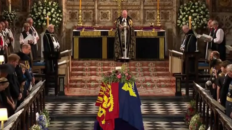 Queen Elizabeth II’s casket lowered into St. George’s Chapel royal vault