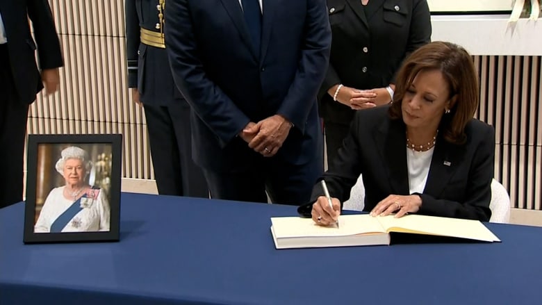VP Harris signs condolence book for queen