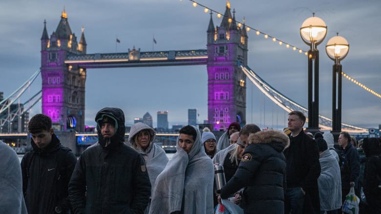 Mourners for Queen Elizabeth II in good spirits despite cold, long line to see her lying in state