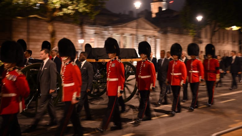 Military bands, carriages rehearse for procession of queen's casket