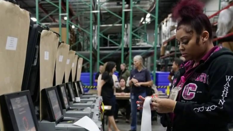 Scenes from Election Day: Polling places without paper, long lines, last-minute campaign stops