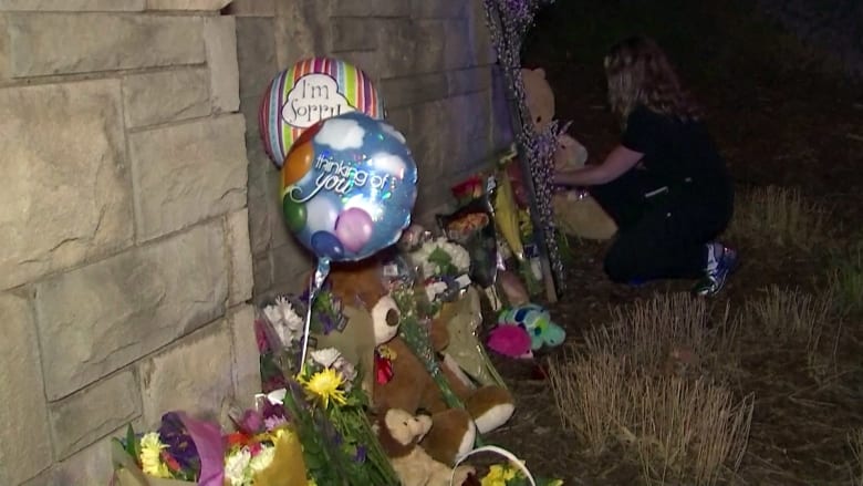 Mourners gather at memorial outside The Covenant School