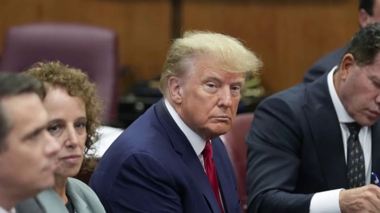 First photos released of Trump in courtroom for arraignment