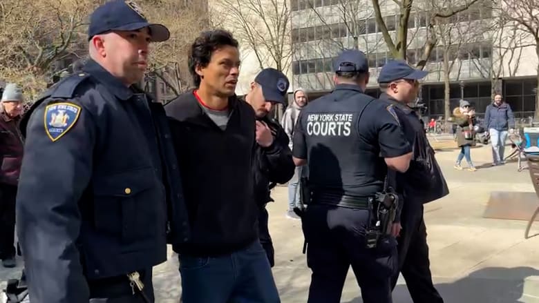 Watch: Police arrest man near courthouse where Trump will be arraigned