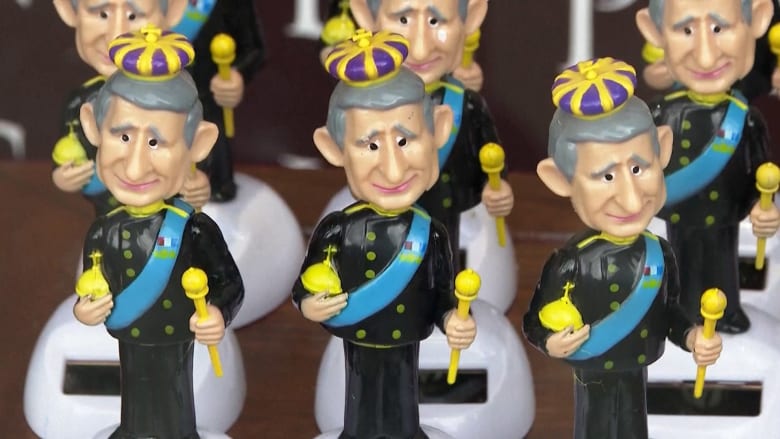 'Dancing king' dolls are popular souvenirs for the coronation