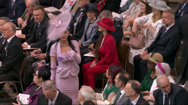 Watch: Katy Perry searches for her coronation seat inside Westminster Abbey