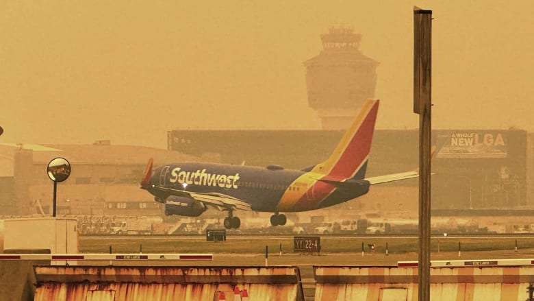 FAA pauses some flights because of reduced visibility from wildfire smoke