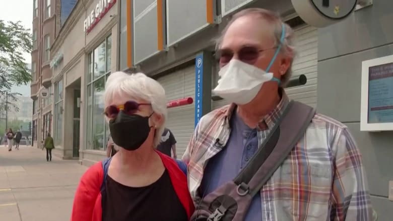 ‘It’s burning on the eyes,’ Chicago visitor says as smoke blankets the Midwest