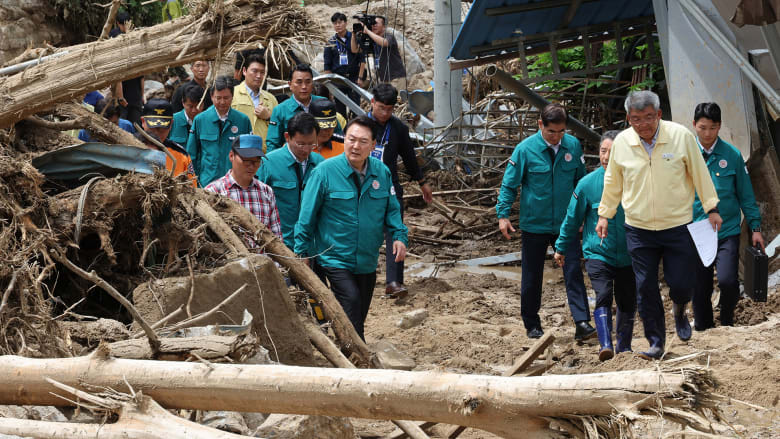 South Korean president visits landslide-hit village as country struggles with heavy rain