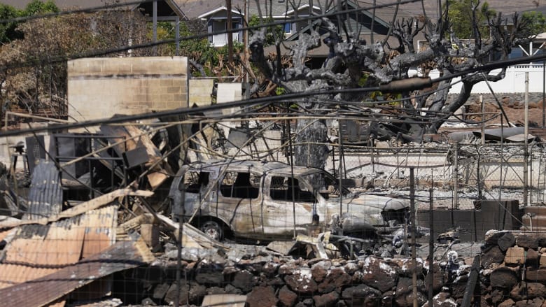 Maui residents return to devastated areas as death toll climbs