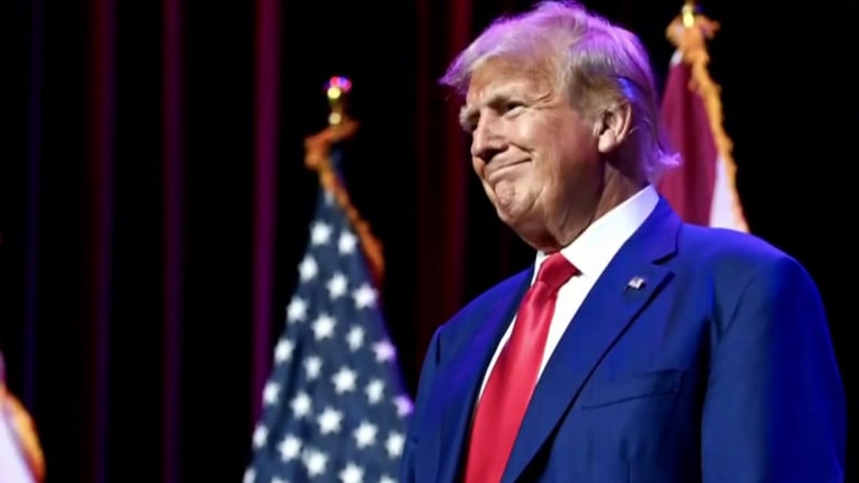 Trump co-defendants start to surrender in Georgia