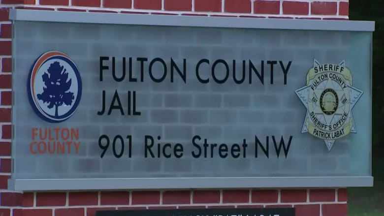 Trump co-defendants surrender for processing in Georgia