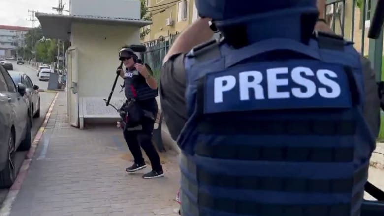 NBC News crew shelters from rocket fire in Israel