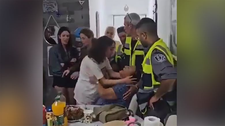Video shows freed Israeli hostage reuniting with her family