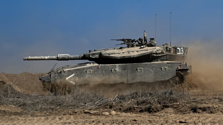 Israeli troops encircle Gaza City with civilians still inside