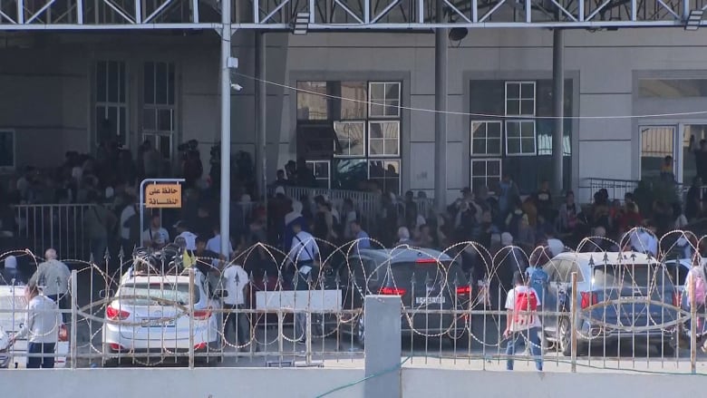 Video shows civilians entering Rafah crossing to Egypt from Gaza