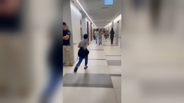 Watch: 9-year-old released by Hamas reunites with father