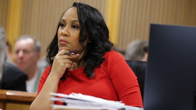 Judge says Fani Willis can stay on Trump case — with conditions