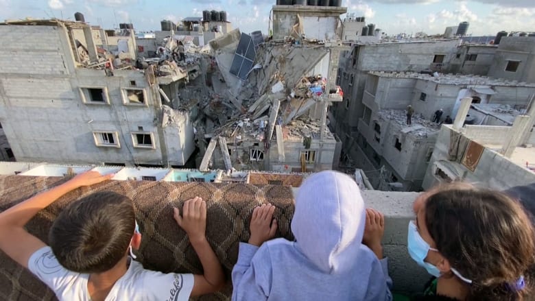 Palestinians search for bodies in rubble after Israeli strikes on Rafah