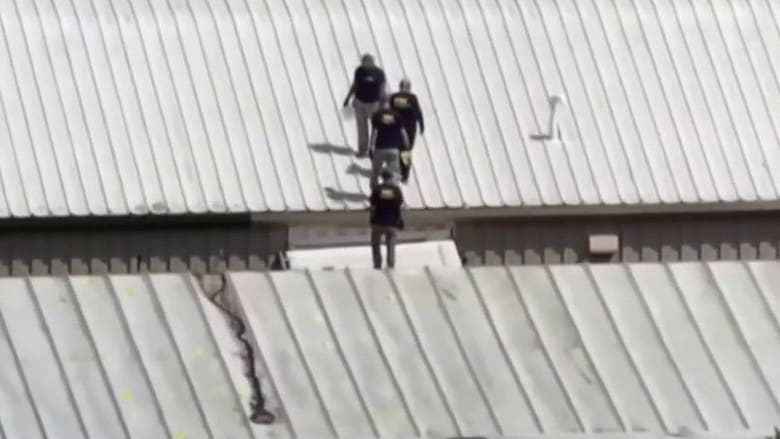 Officials: Alleged Trump shooter was spotted before getting on roof