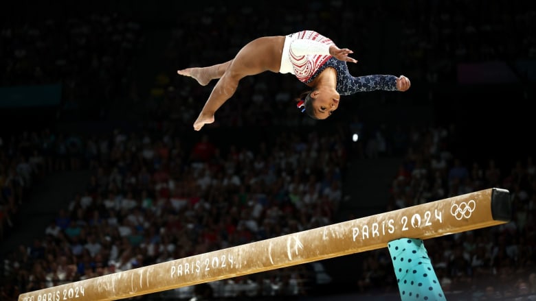 Here's Chiles on the beam last week, helping Team USA win gold