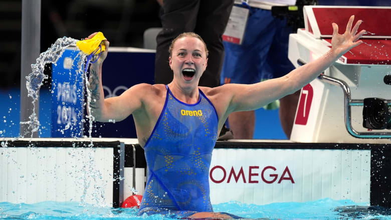 Sjostrom wins gold, Huske takes silver in women's 100m free