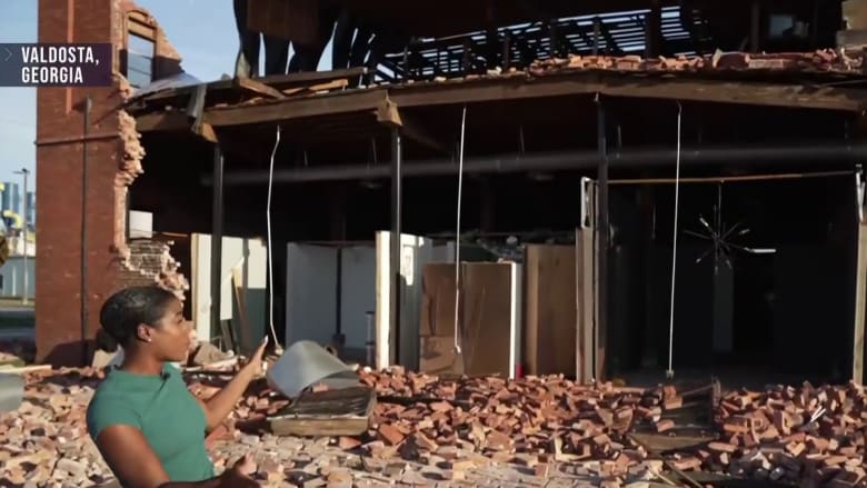 Strong winds knocked out power lines, downed trees and buildings in Georgia