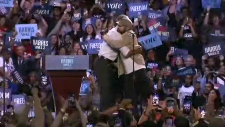 Obama jokes his 'palms are sweaty' after Eminem introduces him at Detroit rally