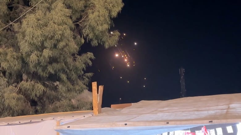 Palestinians in Gaza celebrate seeing Iranian missiles target Israel