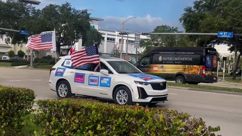 Caravan of cars pass Miami-Dade election HQ in support of Harris