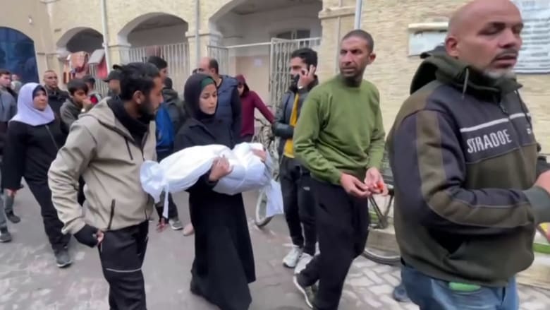 Mourners weep for Palestinians killed in Gaza City after ceasefire announcement
