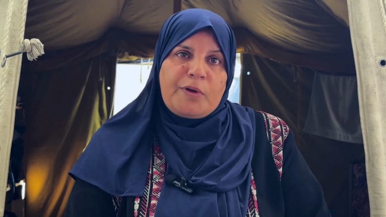 Palestinian mother says the 'painful memory' of Hamas war with Israel will endure