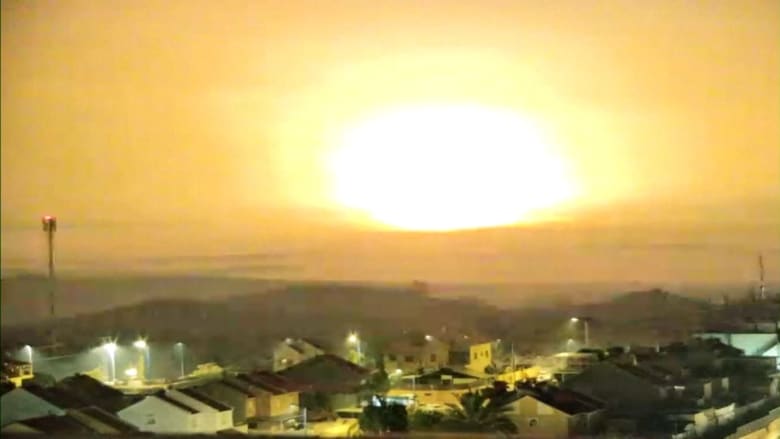 A series of huge blasts illuminate the Gaza skyline early hours of Friday
