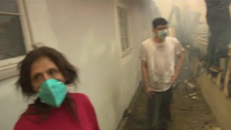Altadena woman reacts to neighbors saving her burning house