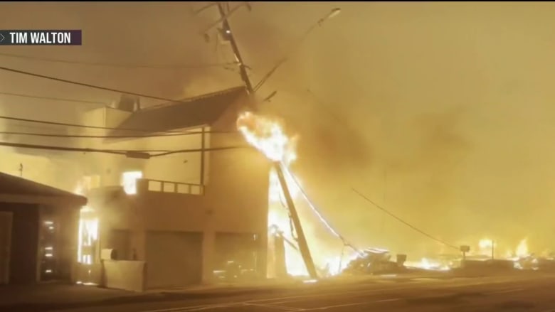 At least five dead as wildfires tear through Los Angeles