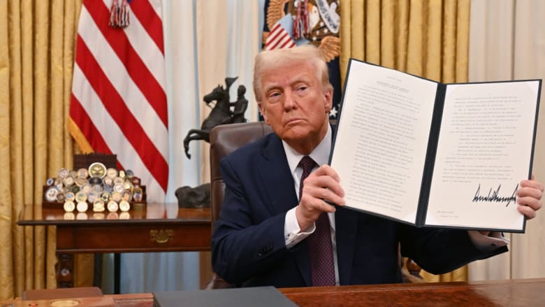 Trump signs executive orders on AI, crypto and declassifying assassination records